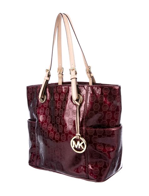 what does a real michael kors handbag look like|Michael Kors patent leather bag.